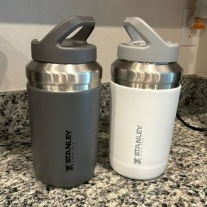 Grey and white Stanley cups. 64 oz